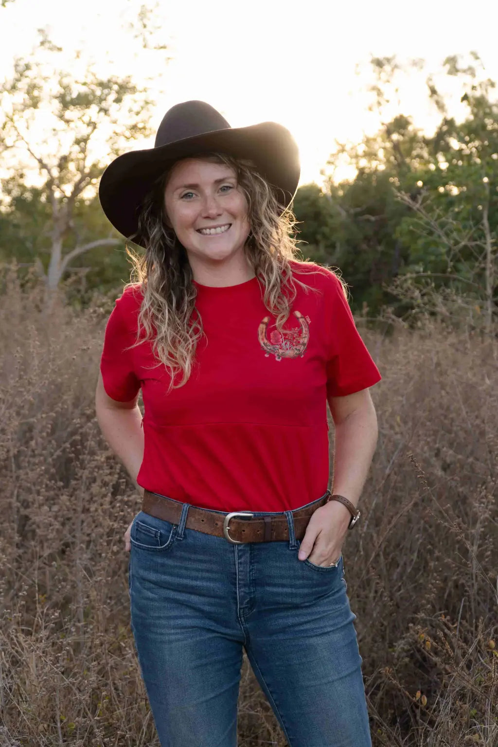 Mum standing outdoors wearing breastfeeding shirt