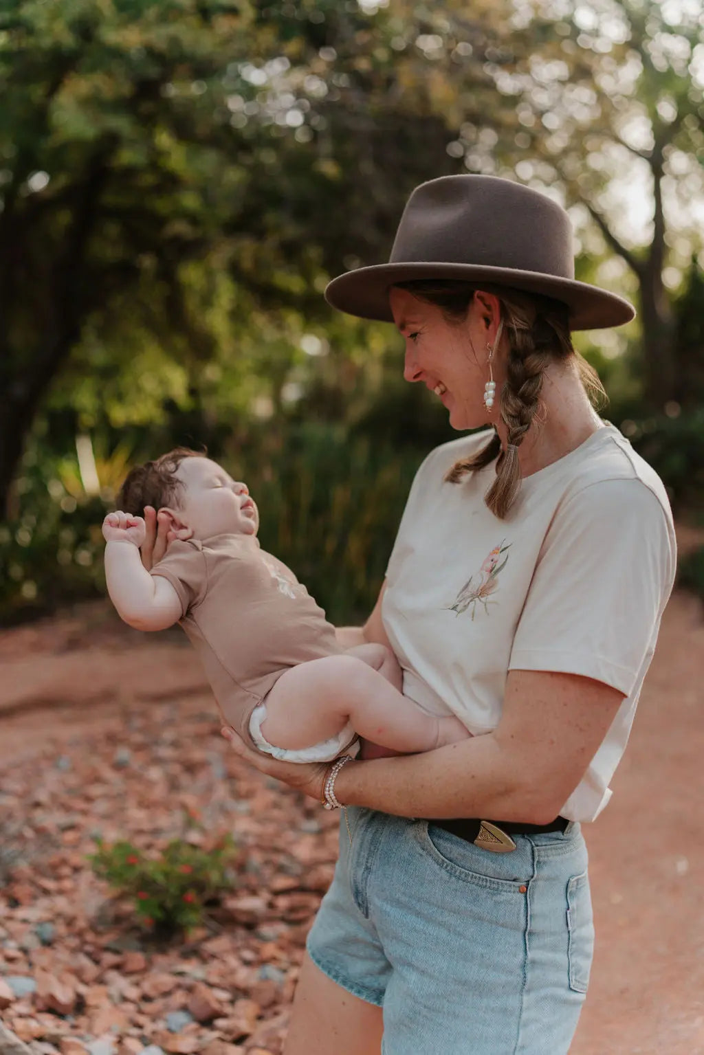 Classic Breastfeeding Tee Nursing Shirt for Mums with Two Way Zip for Easy Breastfeeding Access. Mum wearing an Akubra hat.