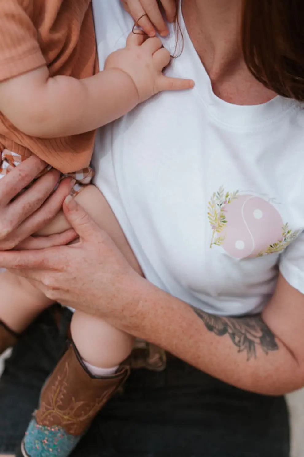 Classic Breastfeeding Tee Nursing Shirt for Mums with Two Way Zip for Easy Breastfeeding Access. Mum holding toddler.