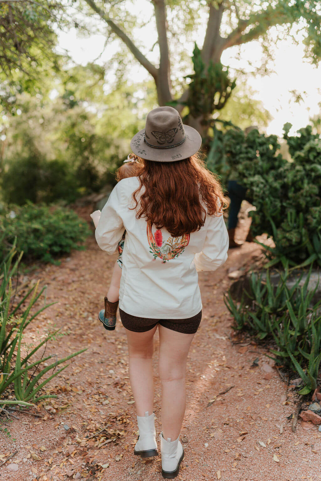 Mum waking with baby outdoors