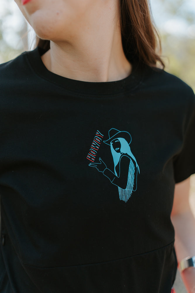 Black t-shirt with a cowgirl and howdy design on a black nursing tee.