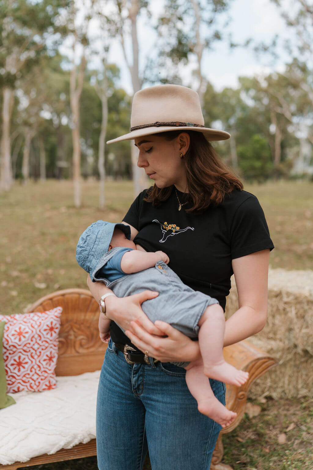 Mum standing and breastfeeding baby 