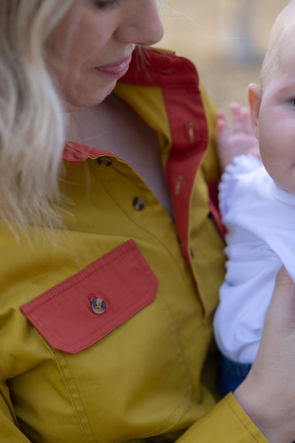 Woman wearing two tone Breastfeeidng shirt 