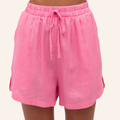 Pink maternity shorts with a drawstring on a white background